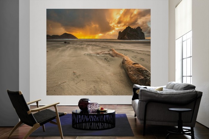 Die Fototapete Strand von Neuseeland bei Sonnenuntergang als große Bildtapete im Wohnzimmer. Als Bildtapete ist die Fototapete Strand von Neuseeland bei Sonnenuntergang ein besonderes Highlight auf Vliestapete.