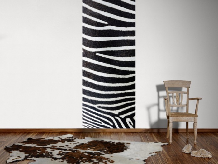 Ein Foto von dem 3D-Fotopanel Fell vom Zebra im Detail tapeziert an der Wand. Bestelle Deine Bildtapete online.