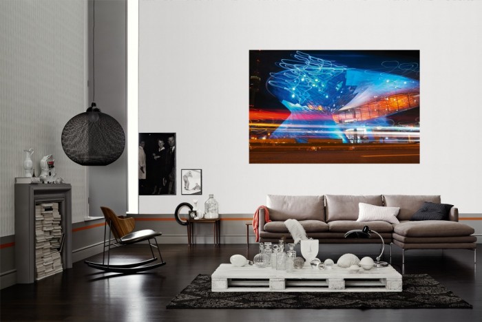 Die Fototapete München, BMW World in Bewegung als Wandbild im Wohnzimmer. Die Vlies-Fototapete München, BMW World in Bewegung verschönert als Wandbild Deine Wand.