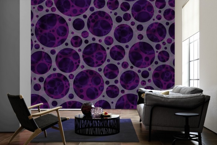 Im Wohnzimmer die Design-Fototapete 3D-Geometrie organische Kreise auf einer großen Wand tapeziert. Die Design-Fototapete 3D-Geometrie organische Kreise ist als Vlies-Fototapete im Wohnzimmer leicht zu tapezieren.