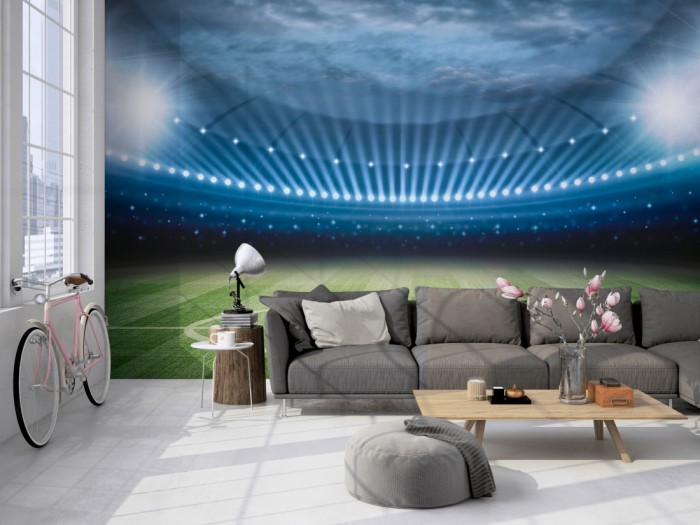 Die Fototapete Fußball Stadtion auf einer großen Wand im Loft tapeziert. Die Fototapete Fußball Stadtion wird individuell auf Deine Wand angepasst.