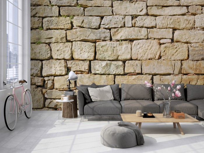 Die Fototapete Stein Wand, Burgmauer auf einer großen Wand im Loft tapeziert. Die Fototapete Stein Wand, Burgmauer wird individuell auf Deine Wand angepasst.