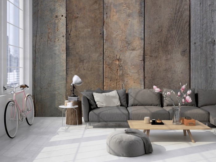 Die Fototapete Holz Wand, vergraute Eiche auf einer großen Wand im Loft tapeziert. Die Fototapete Holz Wand, vergraute Eiche wird individuell auf Deine Wand angepasst.
