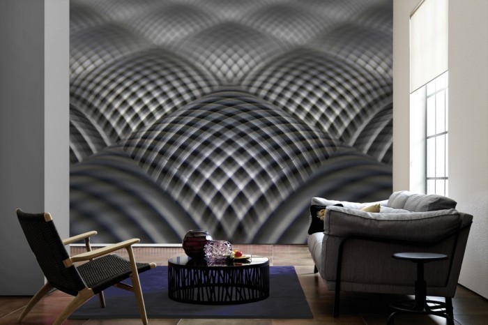 Im Wohnzimmer die Design-Fototapete 3D-Geometrie schwarz-weiße Rauten auf einer großen Wand tapeziert. Die Design-Fototapete 3D-Geometrie schwarz-weiße Rauten ist als Vlies-Fototapete im Wohnzimmer leicht zu tapezieren.