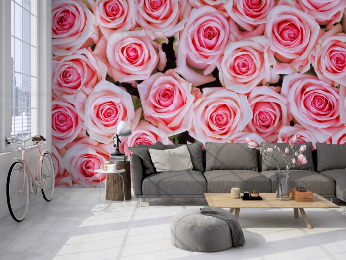 Die Fototapete Rosen in rosa, Blütenmeer auf einer großen Wand im Loft tapeziert. Die Fototapete Rosen in rosa, Blütenmeer wird individuell auf Deine Wand angepasst.