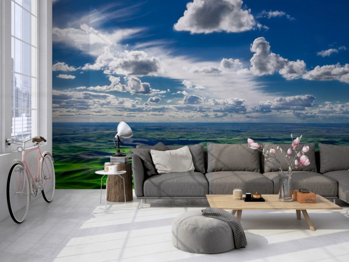 Die Fototapete Hügellandschaft in Amerika im Sommer auf einer großen Wand im Loft tapeziert. Die Fototapete Hügellandschaft in Amerika im Sommer wird individuell auf Deine Wand angepasst.