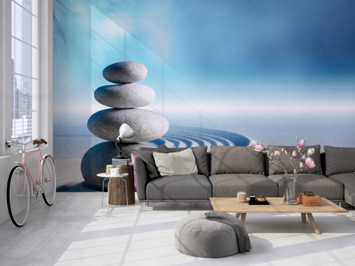 Die Fototapete Wellness, Wellness-Steine und Seerose im Sand auf einer großen Wand im Loft tapeziert. Die Fototapete Wellness, Wellness-Steine und Seerose im Sand wird individuell auf Deine Wand angepasst.