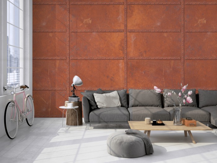 Die Fototapete Altes Eisen, Rostwand auf einer großen Wand im Loft tapeziert. Die Fototapete Altes Eisen, Rostwand wird individuell auf Deine Wand angepasst.