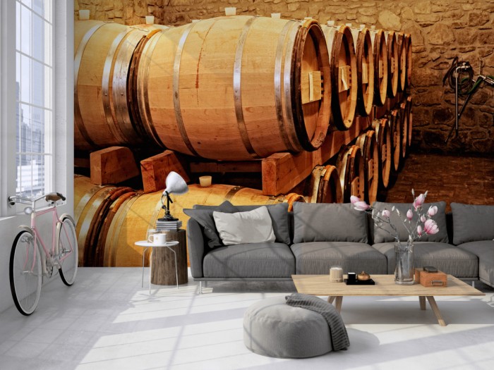 Die Fototapete Weinkeller mit Fässern auf einer großen Wand im Loft tapeziert. Die Fototapete Weinkeller mit Fässern wird individuell auf Deine Wand angepasst.