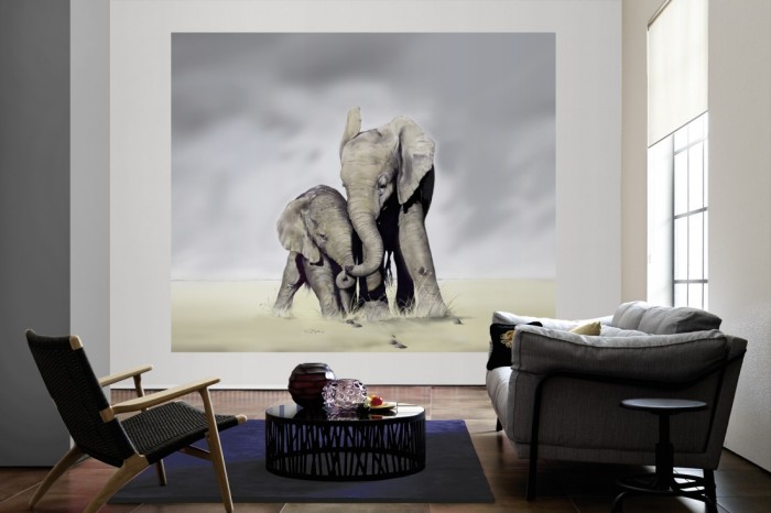 Die Fototapete Elefanten Familie als große Bildtapete im Wohnzimmer. Als Bildtapete ist die Fototapete Elefanten Familie ein besonderes Highlight auf Vliestapete.