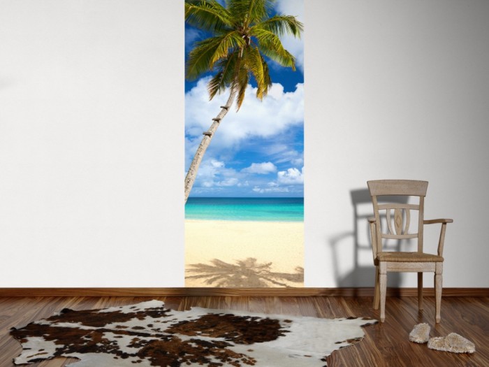 Ein Foto von dem 3D Fotopanel Strand der Südsee mit Palme tapeziert an der Wand. Bestelle Deine Bildtapete online.