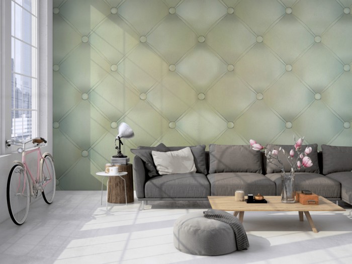 Die Design-Fototapete 3D-Effekt mit türkis-grünem Polster auf einer großen Wand im Loft tapeziert. Die Design-Fototapete 3D-Effekt mit türkis-grünem Polster wird individuell auf Deine Wand angepasst.