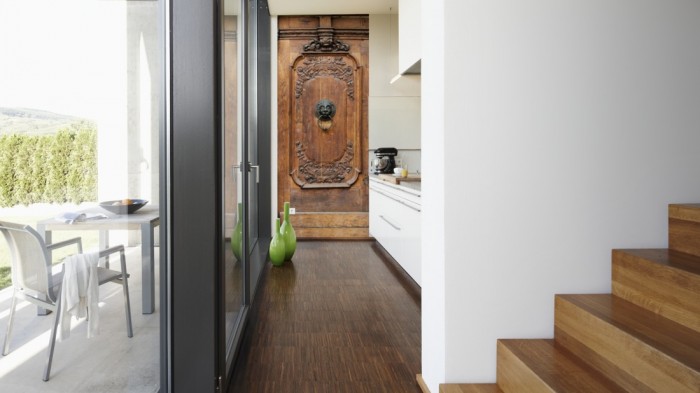 Ein Foto von dem 3D Fotopanel Klassische Holzvertäfelung aus Eiche tapeziert in der Küche. Bestelle Deine Bildtapete online.