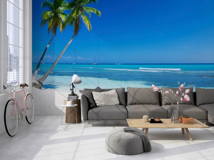 Die Fototapete Strand mit Palmen auf Jamaika auf einer großen Wand im Loft tapeziert. Die Fototapete Strand mit Palmen auf Jamaika wird individuell auf Deine Wand angepasst.