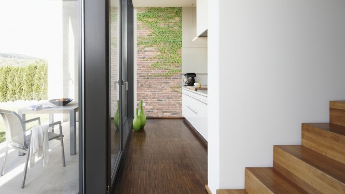 Ein Foto von dem 3D-Fotopanel Ziegel Steinwand mit Efeu tapeziert in der Küche. Bestelle Deine Bildtapete online.