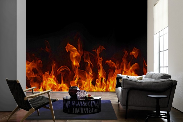 Im Wohnzimmer die Fototapete Feuer und Flamme auf einer großen Wand tapeziert. Die Fototapete Feuer und Flamme ist als Vlies-Fototapete im Wohnzimmer leicht zu tapezieren.