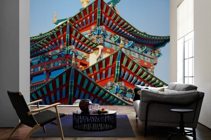 Im Wohnzimmer die Fototapete Tempel in Asien auf einer großen Wand tapeziert. Die Fototapete Tempel in Asien ist als Vlies-Fototapete im Wohnzimmer leicht zu tapezieren.
