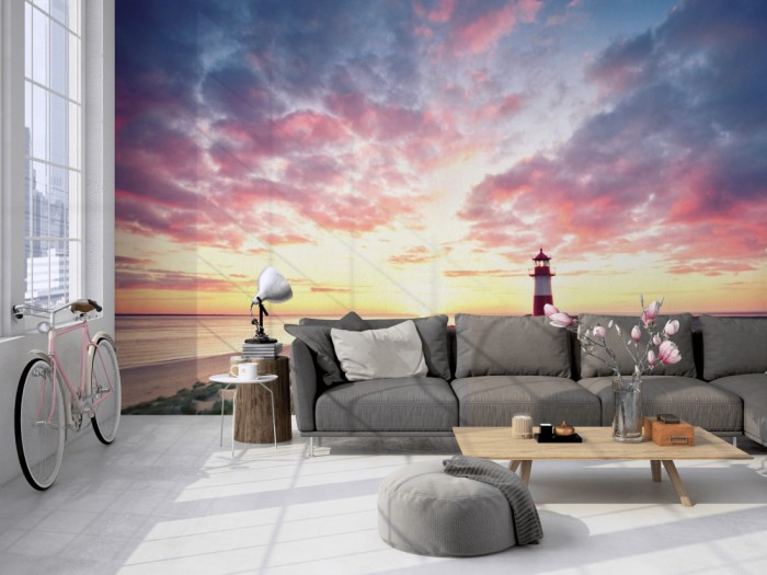 Die Fototapete Leuchtturm von Sylt bei Sonnenaufgang auf einer großen Wand im Loft tapeziert. Die Fototapete Leuchtturm von Sylt bei Sonnenaufgang wird individuell auf Deine Wand angepasst.