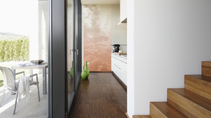 Ein Foto von dem Design-Fotopanel Wolkenhimmel im Morgengrauen tapeziert in der Küche. Bestelle Deine Bildtapete online.