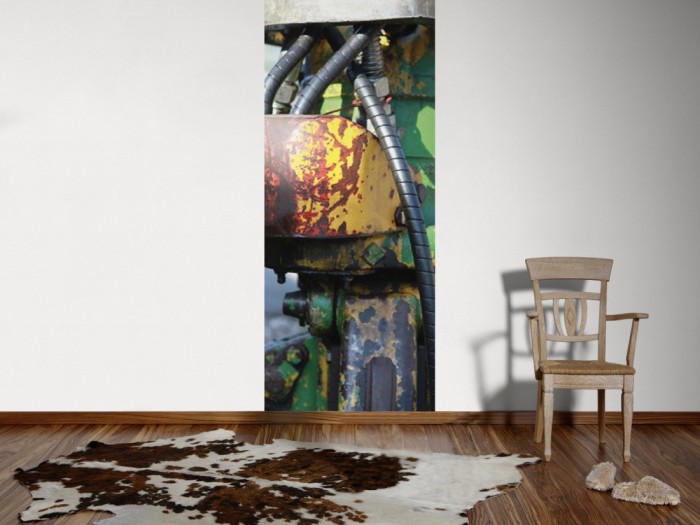 Ein Foto von dem 3D-Fotopanel Detailbild eines alten Roboters tapeziert an der Wand. Bestelle Deine Bildtapete online.