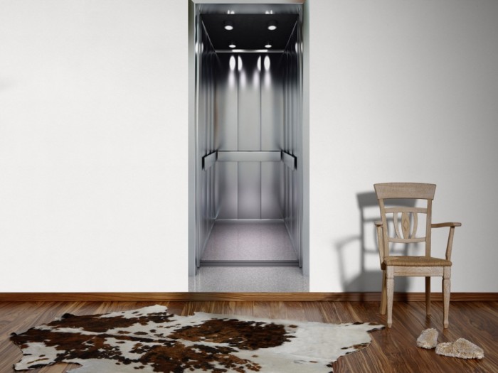 Ein Foto von dem 3D Fotopanel Moderner Aufzug tapeziert an der Wand. Bestelle Deine Bildtapete online.