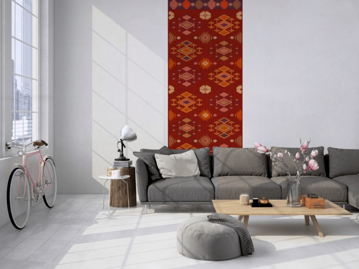 Das Design-Fotopanel Teppich im Ethno-Look tapeziert in einem Loft. Bestelle die Bildtapete für Deine Wand online.