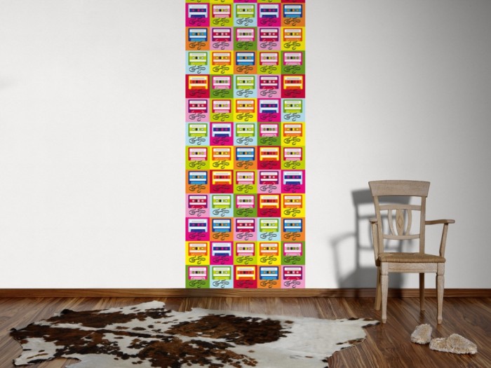Ein Foto von dem Design-Fotopanel Bunte Kassetten, Artwork tapeziert an der Wand. Bestelle Deine Bildtapete online.