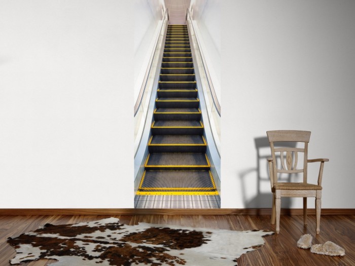 Ein Foto von dem 3D Fotopanel Rolltreppe tapeziert an der Wand. Bestelle Deine Bildtapete online.