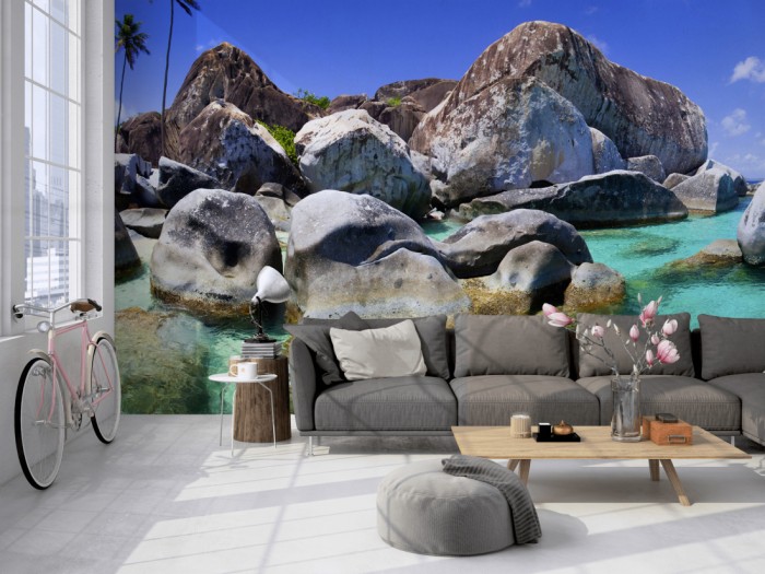 Die Fototapete Meer der Seychellen auf einer großen Wand im Loft tapeziert. Die Fototapete Meer der Seychellen wird individuell auf Deine Wand angepasst.