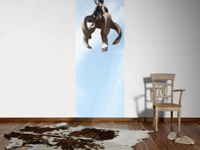 Ein Foto von dem 3D-Fotopanel Arm eines Baggers vom Schrottplatz tapeziert an der Wand. Bestelle Deine Bildtapete online.