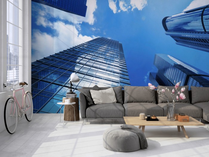 Die Fototapete Wolkenkratzer in Downtown auf einer großen Wand im Loft tapeziert. Die Fototapete Wolkenkratzer in Downtown wird individuell auf Deine Wand angepasst.