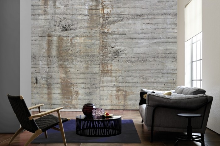 Im Wohnzimmer die Fototapete Beton Wand, alte Fabrik auf einer großen Wand tapeziert. Die Fototapete Beton Wand, alte Fabrik ist als Vlies-Fototapete im Wohnzimmer leicht zu tapezieren.