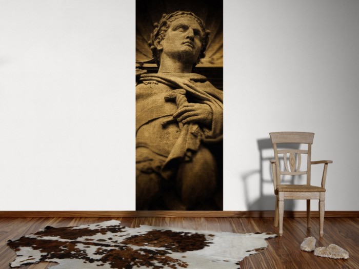 Ein Foto von dem Design-Fotopanel Julius Caesar Statue tapeziert an der Wand. Bestelle Deine Bildtapete online.