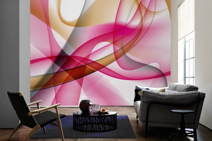 Im Wohnzimmer die Design-Fototapete 3D-Geometrie Abstrakt in Pink auf einer großen Wand tapeziert. Die Design-Fototapete 3D-Geometrie Abstrakt in Pink ist als Vlies-Fototapete im Wohnzimmer leicht zu tapezieren.