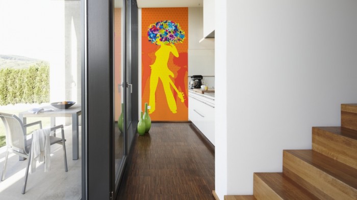 Ein Foto von dem Design-Fotopanel Party der 70er Orange, Artwork tapeziert in der Küche. Bestelle Deine Bildtapete online.