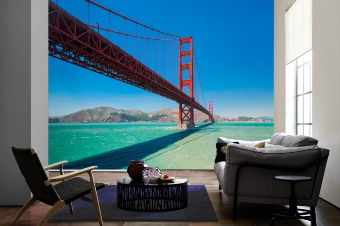 Im Wohnzimmer die Fototapete Golden Gate Bridge, San Francisco auf einer großen Wand tapeziert. Die Fototapete Golden Gate Bridge, San Francisco ist als Vlies-Fototapete im Wohnzimmer leicht zu tapezieren.