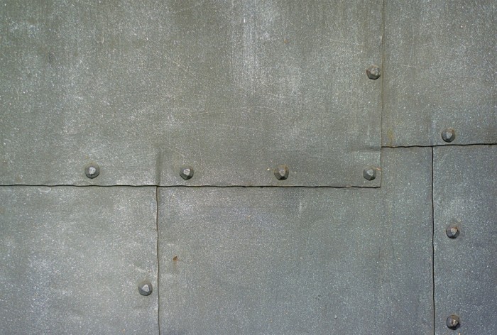 Die Fototapete Metall Wand, Metall mit Nieten, eine Vlies-Fototapete bei Livingwalls Cologne online kaufen. Die Fototapete Metall Wand, Metall mit Nieten ist eine Fototapete auf Maß.