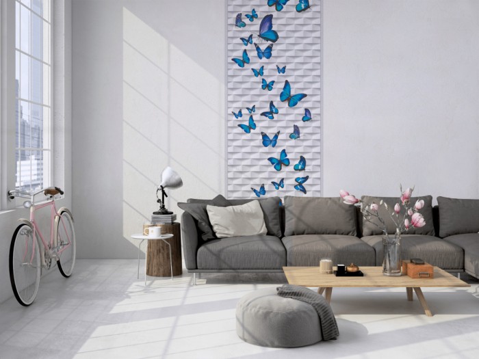 Das 3D-Fotopanel Blaue Schmetteringe tapeziert in einem Loft. Bestelle die Bildtapete für Deine Wand online.