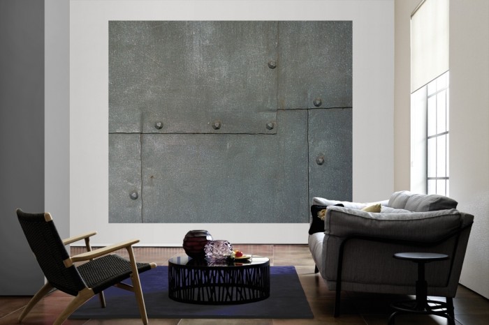 Die Fototapete Metall Wand, Metall mit Nieten als große Bildtapete im Wohnzimmer. Als Bildtapete ist die Fototapete Metall Wand, Metall mit Nieten ein besonderes Highlight auf Vliestapete.