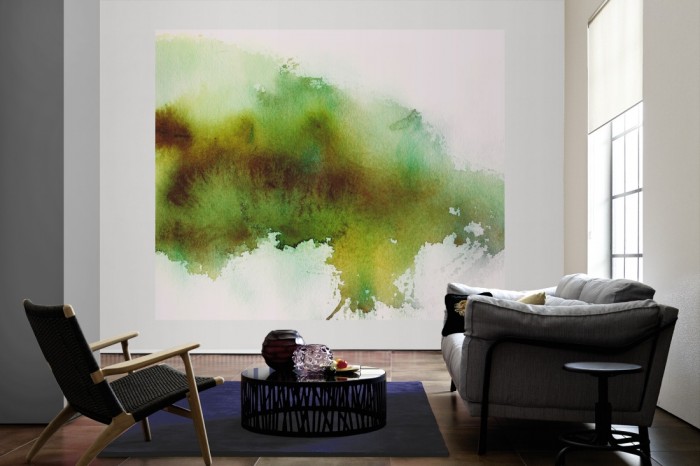 Die Design-Fototapete Verlauf der Wasserfarbe in Grün-Gelb als große Bildtapete im Wohnzimmer. Als Bildtapete ist die Design-Fototapete Verlauf der Wasserfarbe in Grün-Gelb ein besonderes Highlight auf Vliestapete.