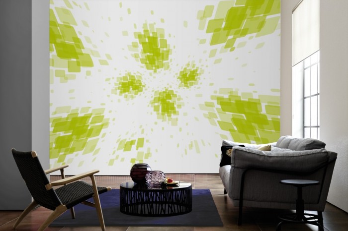 Im Wohnzimmer die Design-Fototapete 3D-Geometrie grüne Rechtecke auf einer großen Wand tapeziert. Die Design-Fototapete 3D-Geometrie grüne Rechtecke ist als Vlies-Fototapete im Wohnzimmer leicht zu tapezieren.