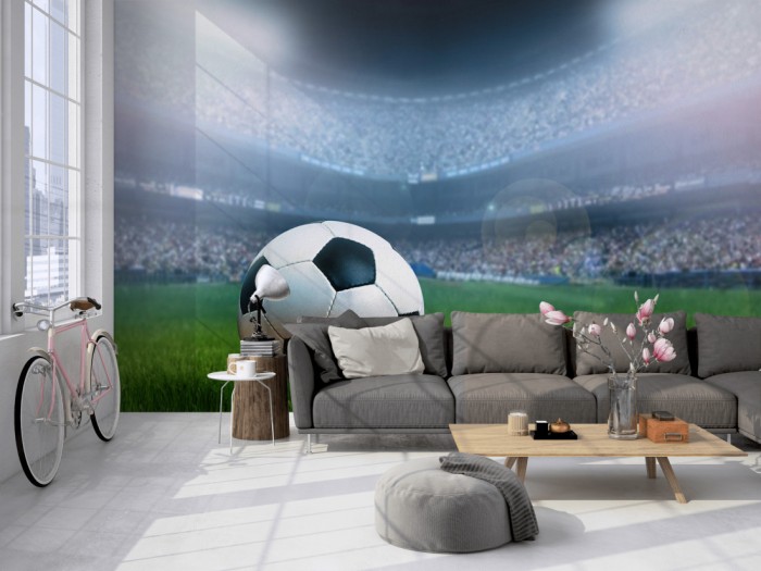 Die Fototapete Fussball im Stadion auf einer großen Wand im Loft tapeziert. Die Fototapete Fussball im Stadion wird individuell auf Deine Wand angepasst.