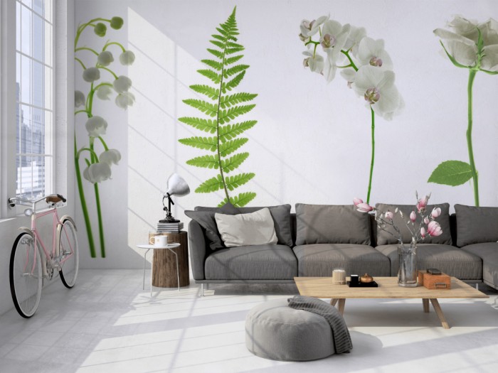 Die Fototapete Blumen in Weiß und Grün auf einer großen Wand im Loft tapeziert. Die Fototapete Blumen in Weiß und Grün wird individuell auf Deine Wand angepasst.