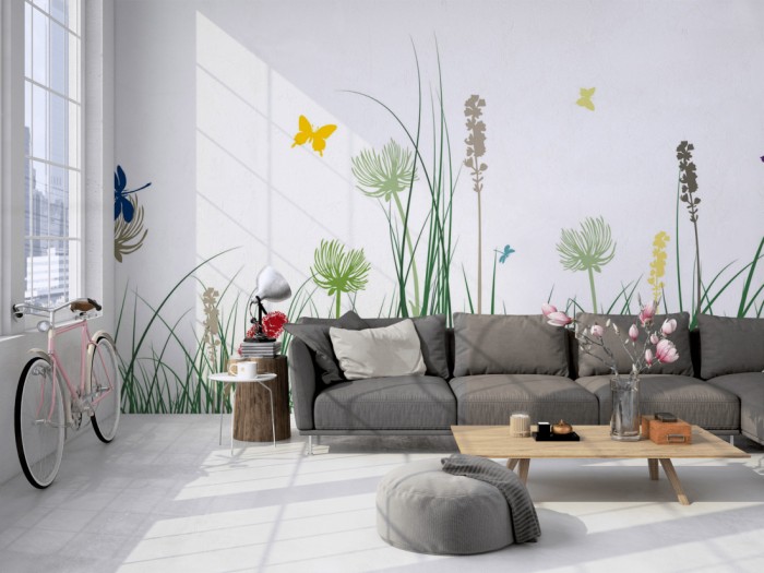 Die Design-Fototapete Blumenwiese Frühling, Artwork auf einer großen Wand im Loft tapeziert. Die Design-Fototapete Blumenwiese Frühling, Artwork wird individuell auf Deine Wand angepasst.