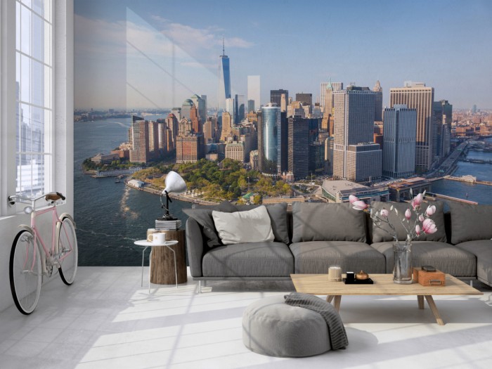 Die Fototapete Manhattan, New York, Financial District auf einer großen Wand im Loft tapeziert. Die Fototapete Manhattan, New York, Financial District wird individuell auf Deine Wand angepasst.