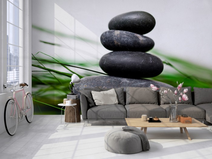 Die Fototapete Wellness, Turm aus Wellness-Steinen auf einer großen Wand im Loft tapeziert. Die Fototapete Wellness, Turm aus Wellness-Steinen wird individuell auf Deine Wand angepasst.