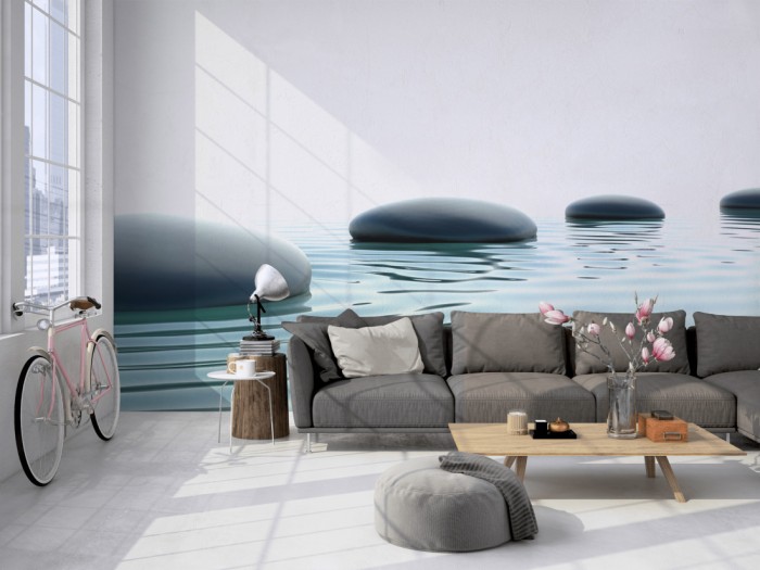 Die Fototapete Wellness, Wellness-Steine im Wasser auf einer großen Wand im Loft tapeziert. Die Fototapete Wellness, Wellness-Steine im Wasser wird individuell auf Deine Wand angepasst.