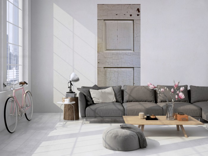 Das 3D Fotopanel Alte Holztür in weiß tapeziert in einem Loft. Bestelle die Bildtapete für Deine Wand online.