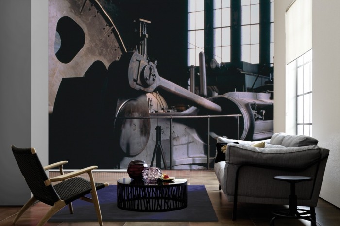Im Wohnzimmer die Fototapete Alte Dampfmaschine auf einer großen Wand tapeziert. Die Fototapete Alte Dampfmaschine ist als Vlies-Fototapete im Wohnzimmer leicht zu tapezieren.