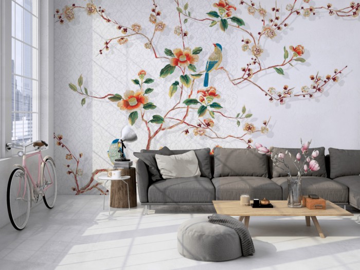 Die Design-Fototapete Vögel in Bunt, Artwork auf einer großen Wand im Loft tapeziert. Die Design-Fototapete Vögel in Bunt, Artwork wird individuell auf Deine Wand angepasst.